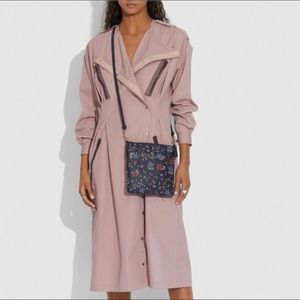 Coach kit messenger with wild flower